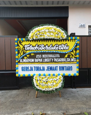 Papan Bunga Duka di Medari